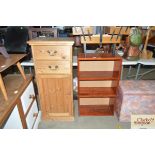 A pine cupboard fitted two drawers together with