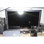 A Panasonic Veira flat screen TV with remote contr