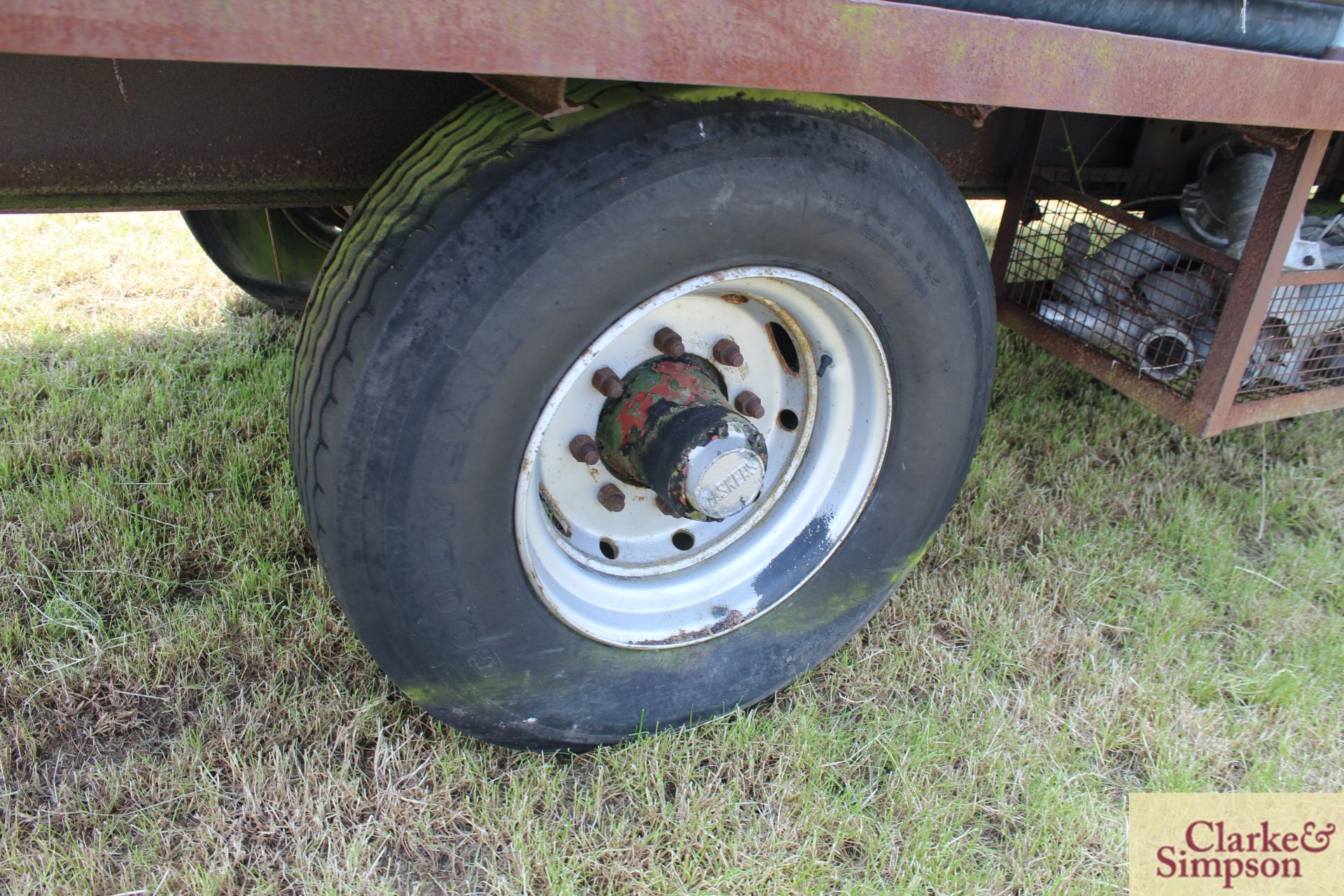 c. 7m single axle flat bed trailer. With super single wheels and tyres. Axle/ brakes stuck. Pipes - Image 10 of 11
