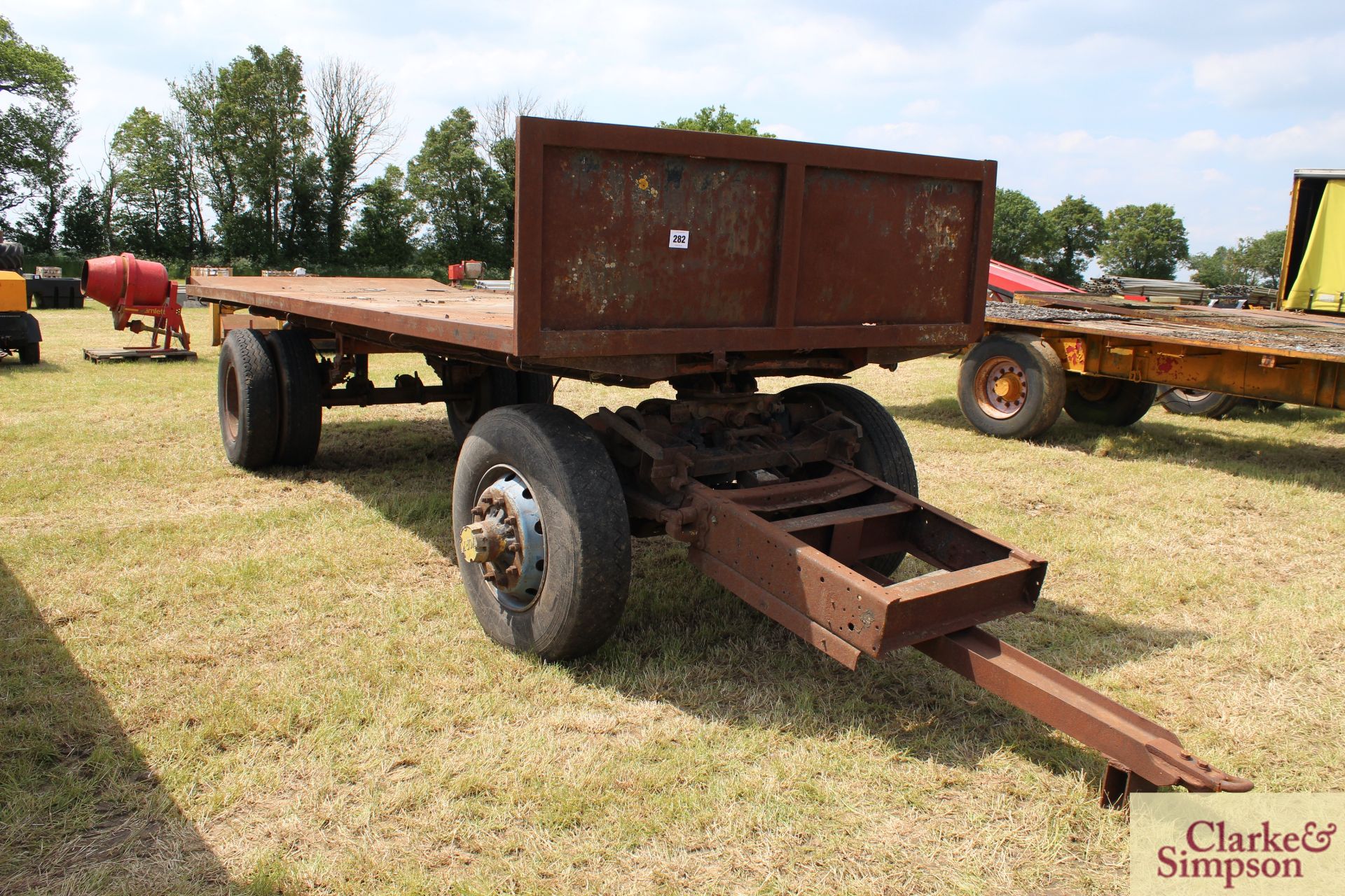 23ft four wheel turntable trailer (ex-Scammel). With twin rear wheels rear draw bar and steel bed.