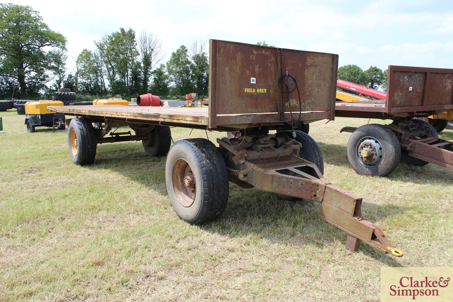 26ft four wheel turntable trailer (ex-Scammel). With super single wheels and tyres and steel bed. M