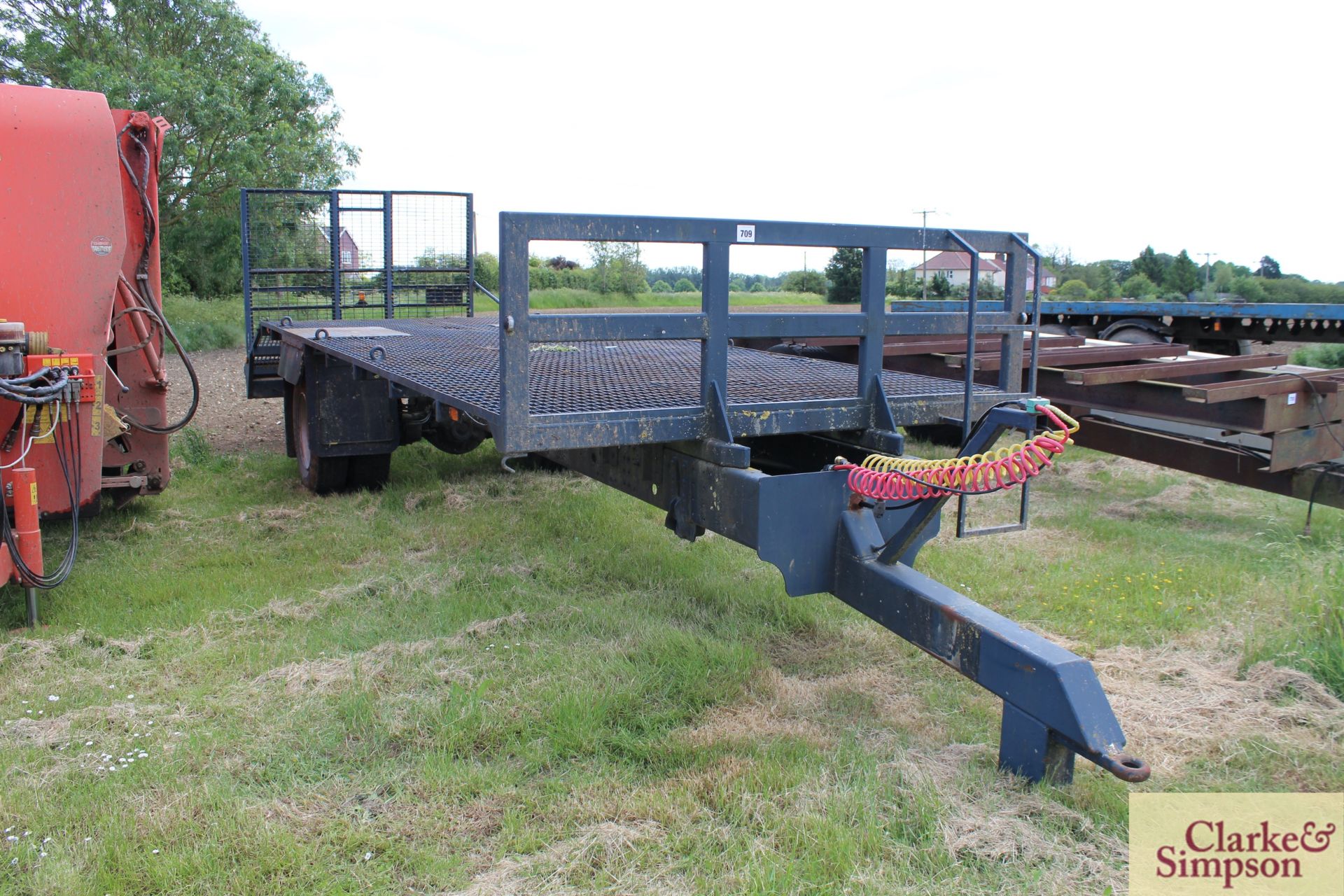 27ft single axle beaver tail trailer. Ex-lorry conversion. With full width mesh ramp and air brakes.