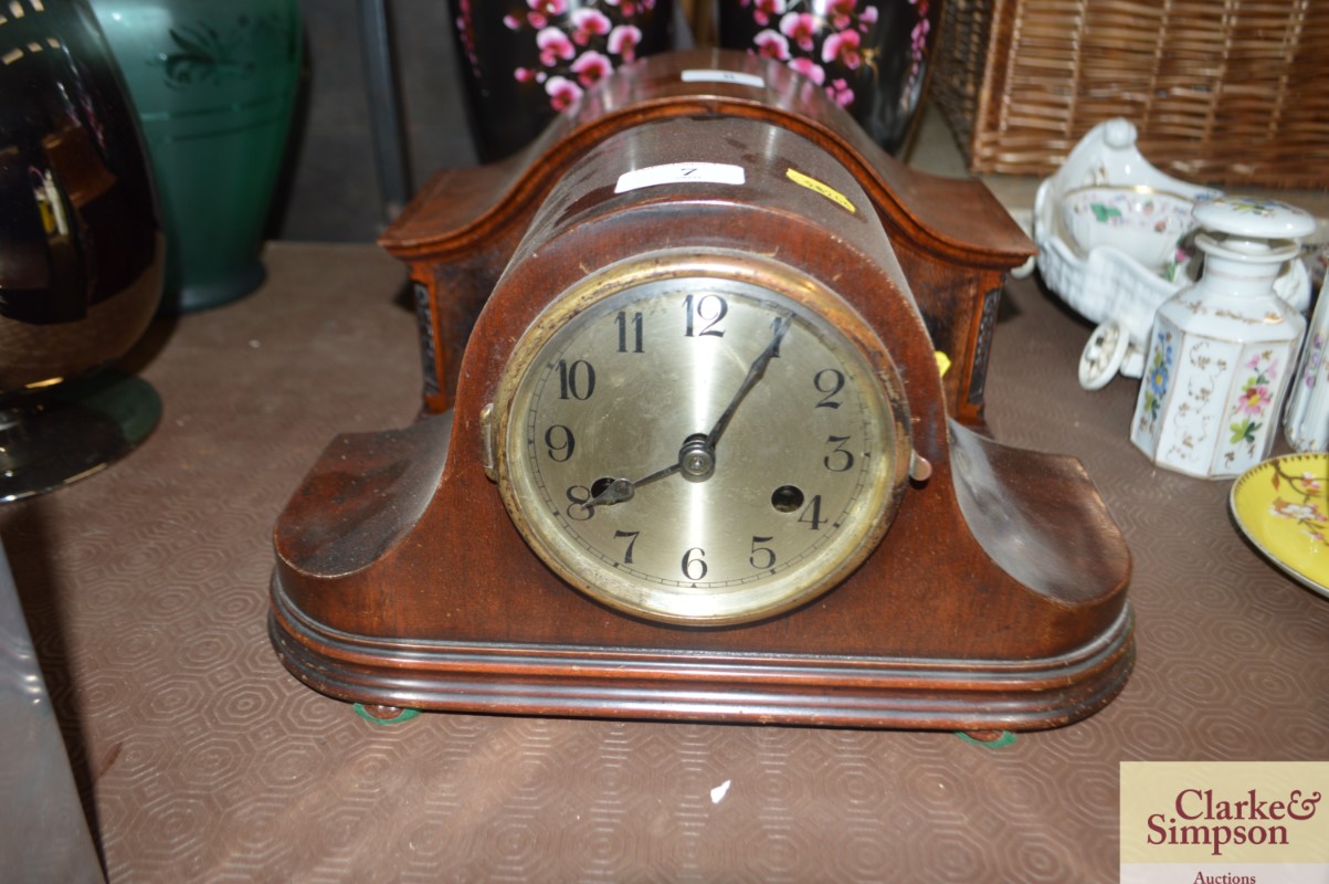 A two hole mantle clock