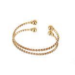 A 9ct gold torque bangle, approx. total weight 15.4