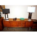 A long G-plan design teak sideboard fitted four ce