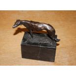A small bronze figure of a dog on marble plinth, 1