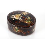 A Kashmiri oval trinket box decorated with polo pl