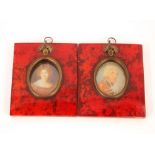 A pair of miniature prints, contained in faux red