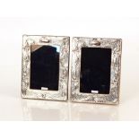 A pair of silver mounted easel photograph frames i