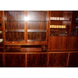 A Hundevad rosewood three section wall unit, fitte