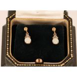 A pair of opal and diamond set drop ear-rings