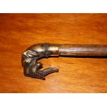 A walking stick, the brass handle in the form of a