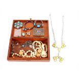 A mahogany trinket box and contents of various cos