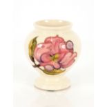 A Moorcroft "Pink Magnolia" pattern vase of balust