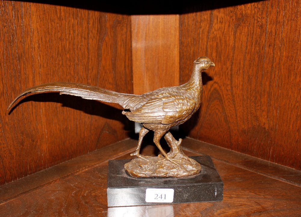 A bronze figure of a pheasant on marble plinth, 29cm long