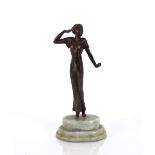 A spelter Art Deco style figurine of a dancing lad
