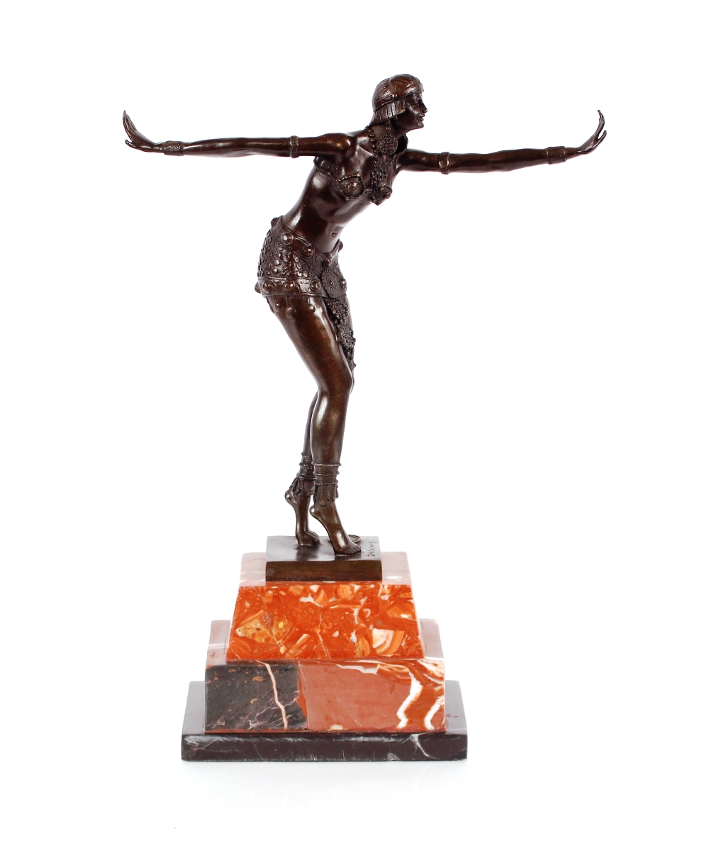 An Art Deco style bronze figure of a dancing girl,