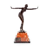 An Art Deco style bronze figure of a dancing girl,