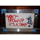 A Banksy design mirrored print "Don't Grow Up, It'