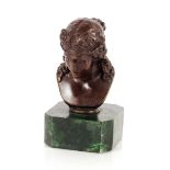 A bronze bust, in the classical style on faux Mala