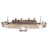 A polished metal model of a Titanic type ocean lin