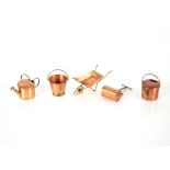 A small copper and brass mounted garden set