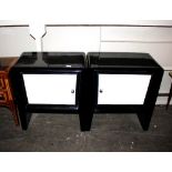 A pair of black and white Art Deco design bedside