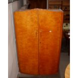 A Czechoslovakia United Upworks walnut wardrobe, 122cm wide; and matching double bed