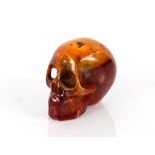 A decorative amber coloured skull