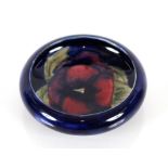 A Moorcroft "Pansy" pattern bowl, the blue ground