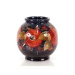 A Moorcroft "Pomegranate" vase of globe form with