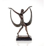 An Art Deco design bronze figure of a semi-naked d