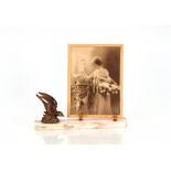 An Art Deco marble and spelter photograph frame ho