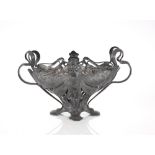 A pewter Art Nouveau jardiniere holder in the WMF