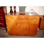 An Art Deco walnut sideboard fitted two long drawe