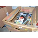 A box of various Commodore and Atari games etc