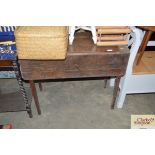 An oak drop leaf table