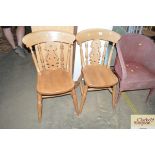 A pair of beech dining chairs