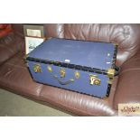 A brass bound travelling trunk