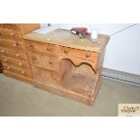 A stripped pine sideboard fitted four drawers