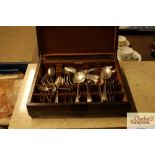 An Art Deco oak cased canteen of plated cutlery