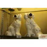 A pair of Beswick seated spaniel ornaments