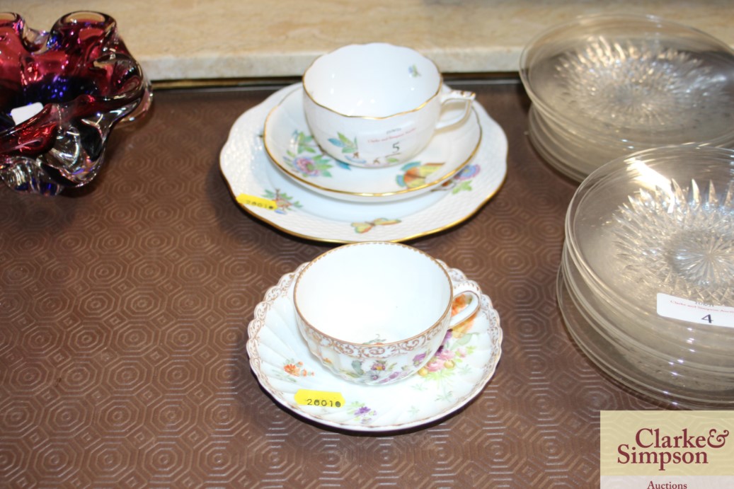 A Herend cup, saucer and matching plate; a Dresden