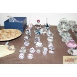 A collection of various crystal glass animal ornam