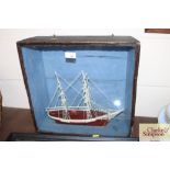 A cased model ship