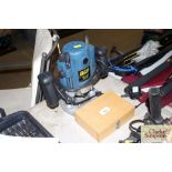 A Powercraft router; and a quantity of bits