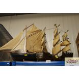 Two model sailing ships