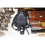 A Canon 400D digital camera with carrying bag