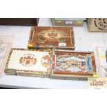 Three old cigar boxes with part contents