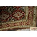 An approx 10' x 7'3" Eastern patterned rug